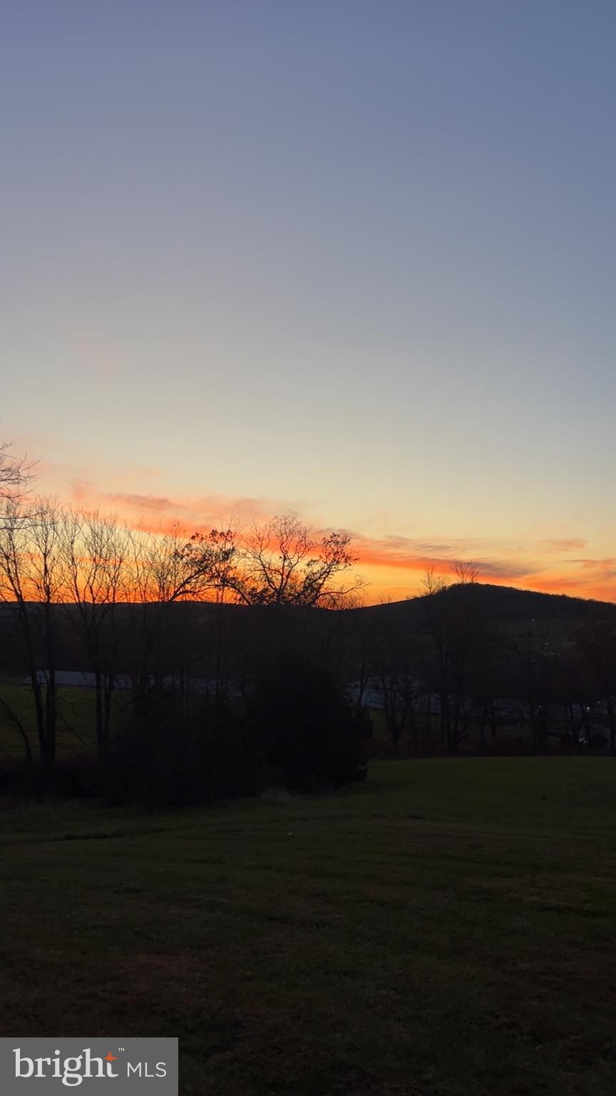 529 Braddock School Road Slanesville, WV 25444 - Photo 39 of 44 a view of mountain view and sunset