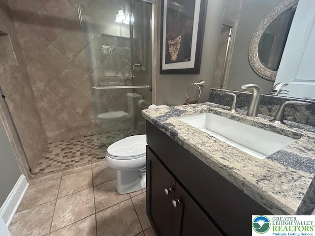1051 Resolution Drive Bethlehem, PA 18017 - Photo 19 of 33 a bathroom with a granite countertop sink toilet and shower