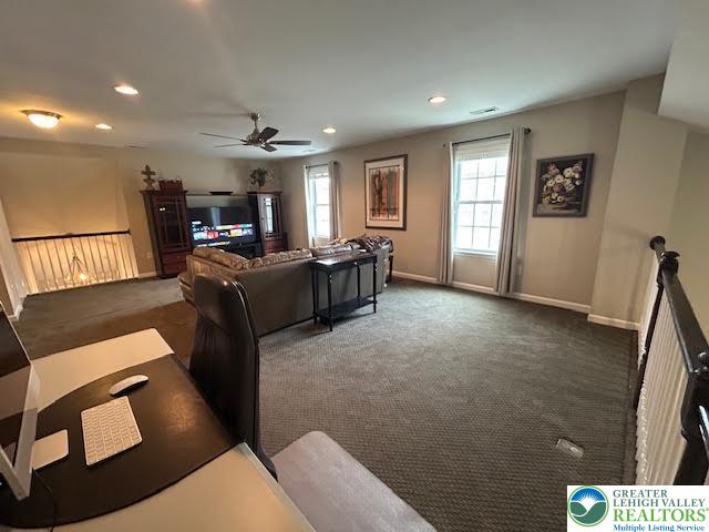 1051 Resolution Drive Bethlehem, PA 18017 - Photo 26 of 33 a living room with furniture and a flat screen tv