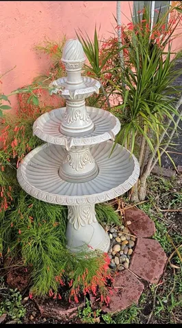a vase of flowers sitting on a table