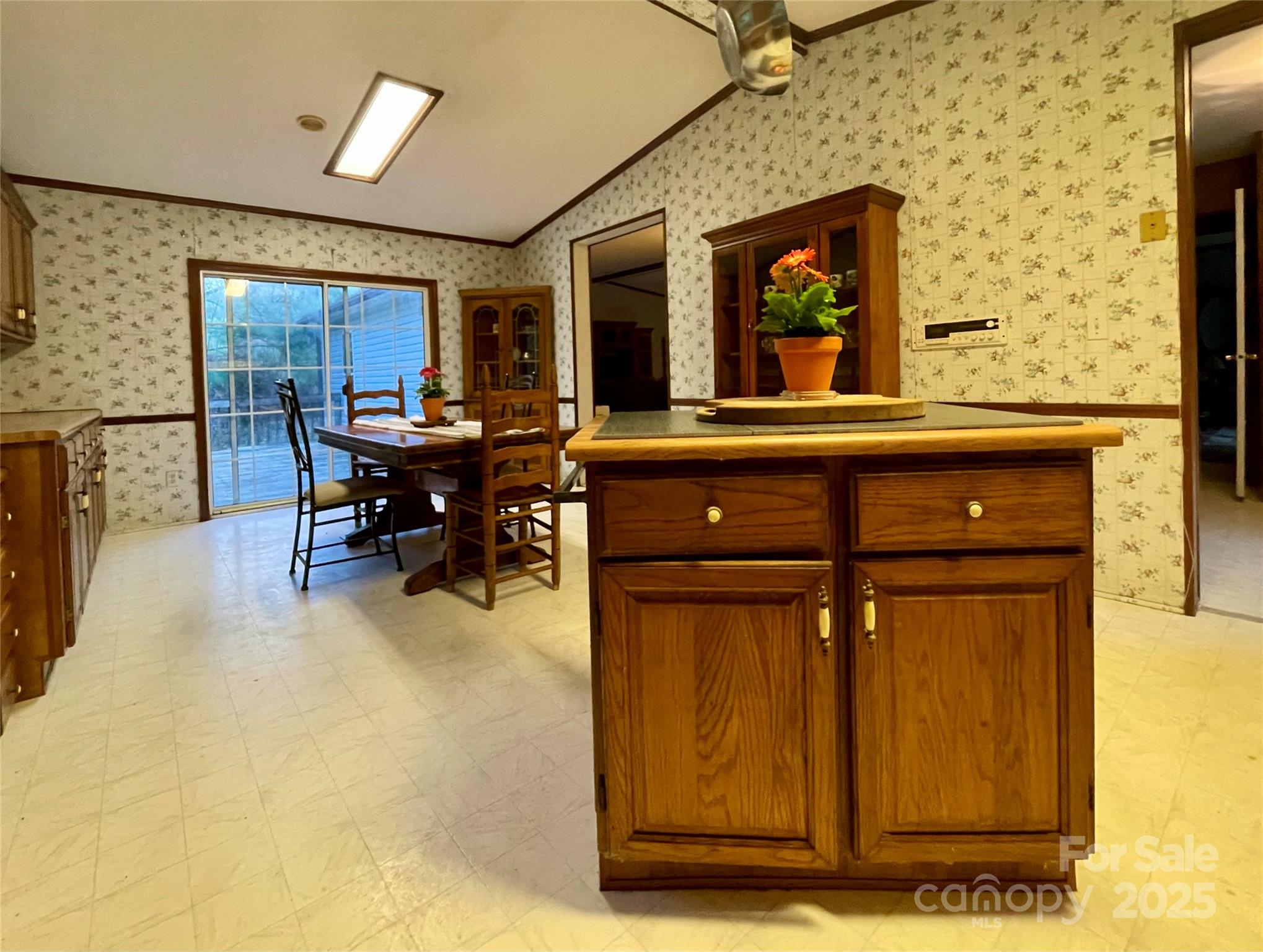 784 Fred Holcombe Road Mars Hill, NC 28754 - Photo 12 of 35 a view of a dining room with furniture