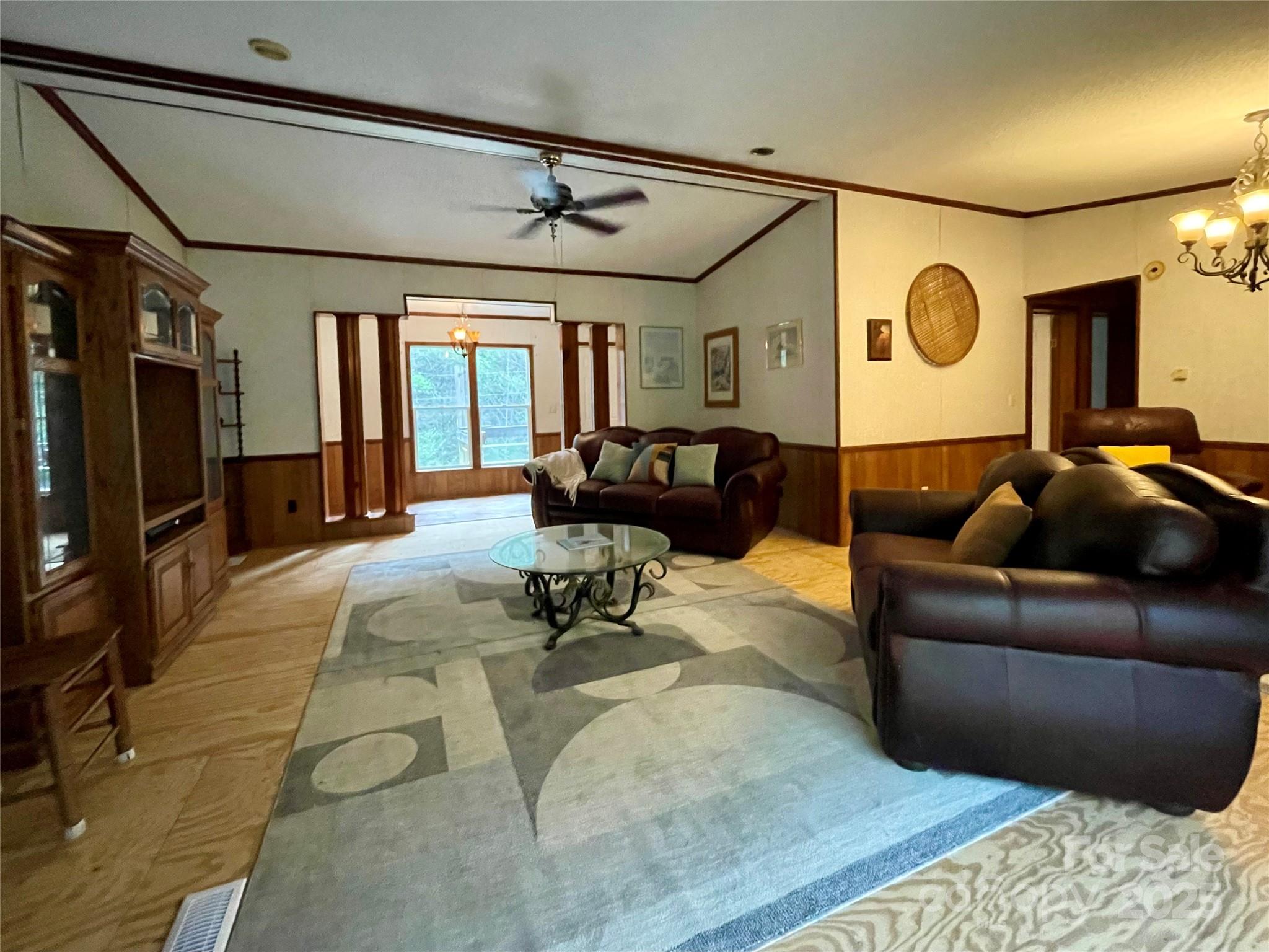 784 Fred Holcombe Road Mars Hill, NC 28754 - Photo 18 of 35 a living room with furniture and a window