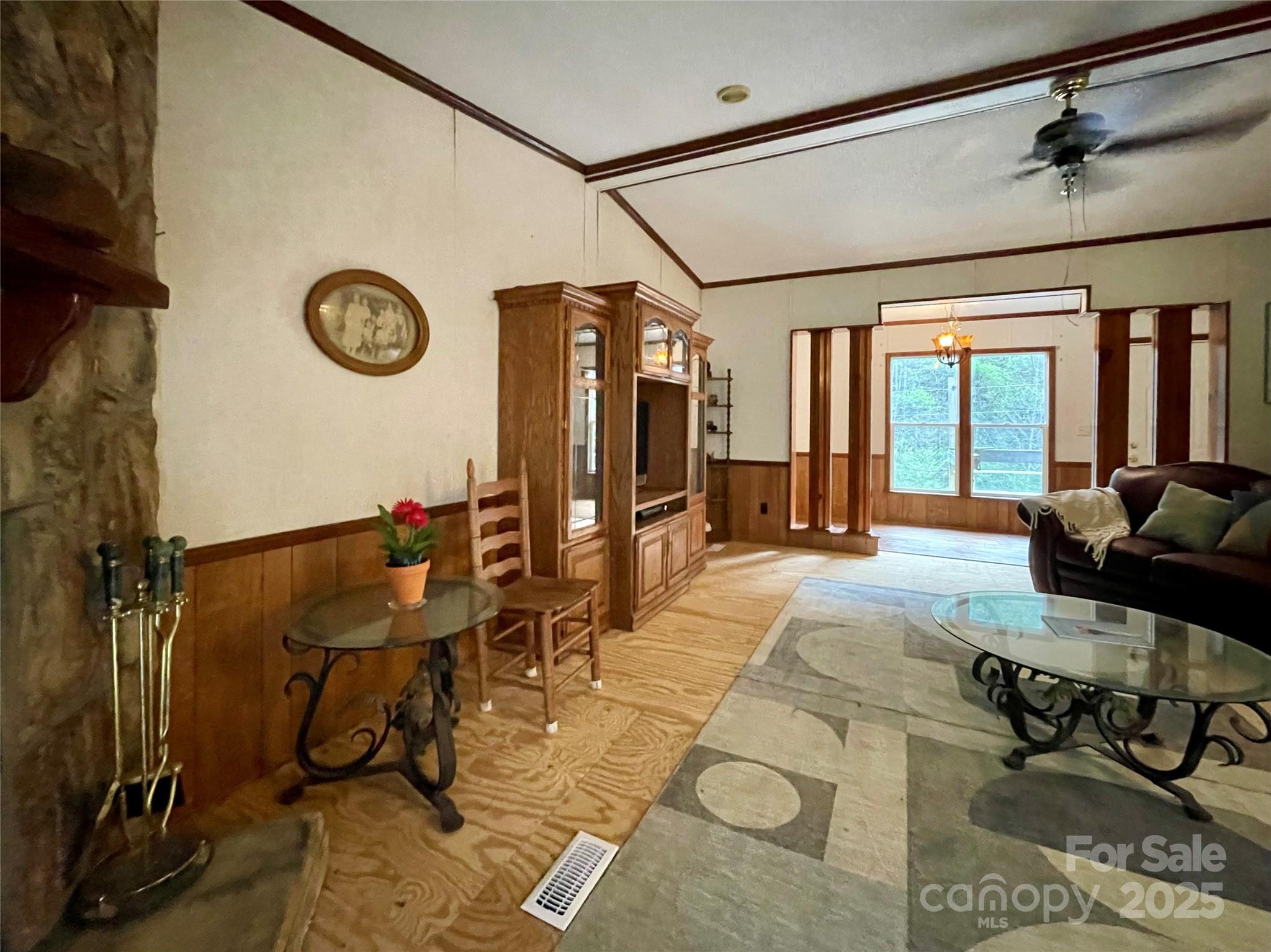 784 Fred Holcombe Road Mars Hill, NC 28754 - Photo 25 of 35 a view of a livingroom with furniture and a large window