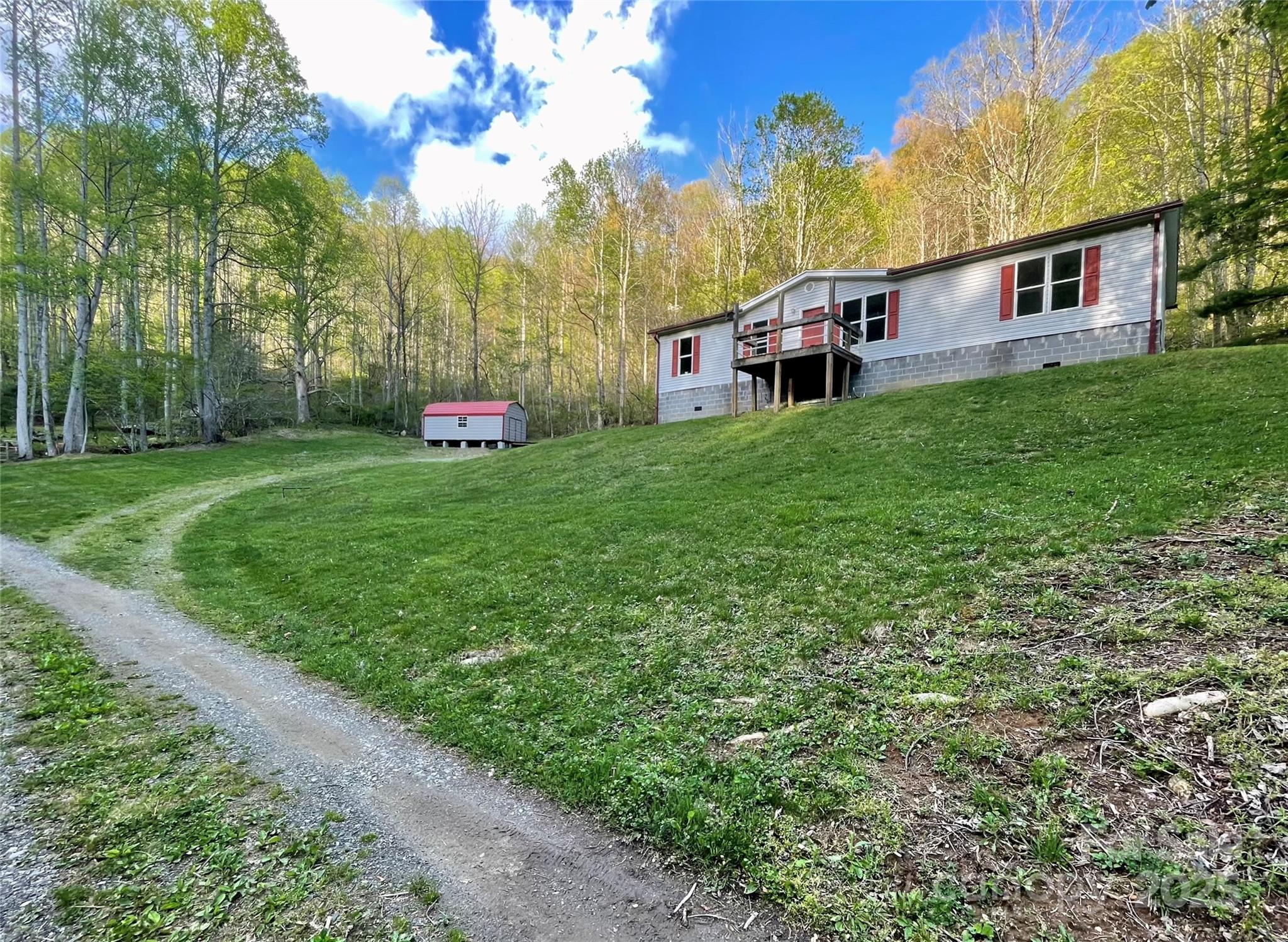 784 Fred Holcombe Road Mars Hill, NC 28754 - Photo 35 of 35 a aerial view of a house