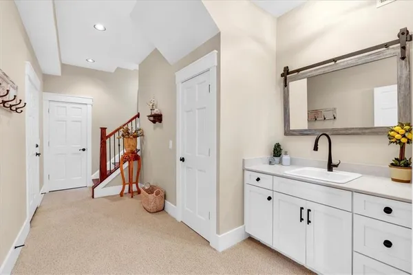 a view of an entryway with wooden floor and a window