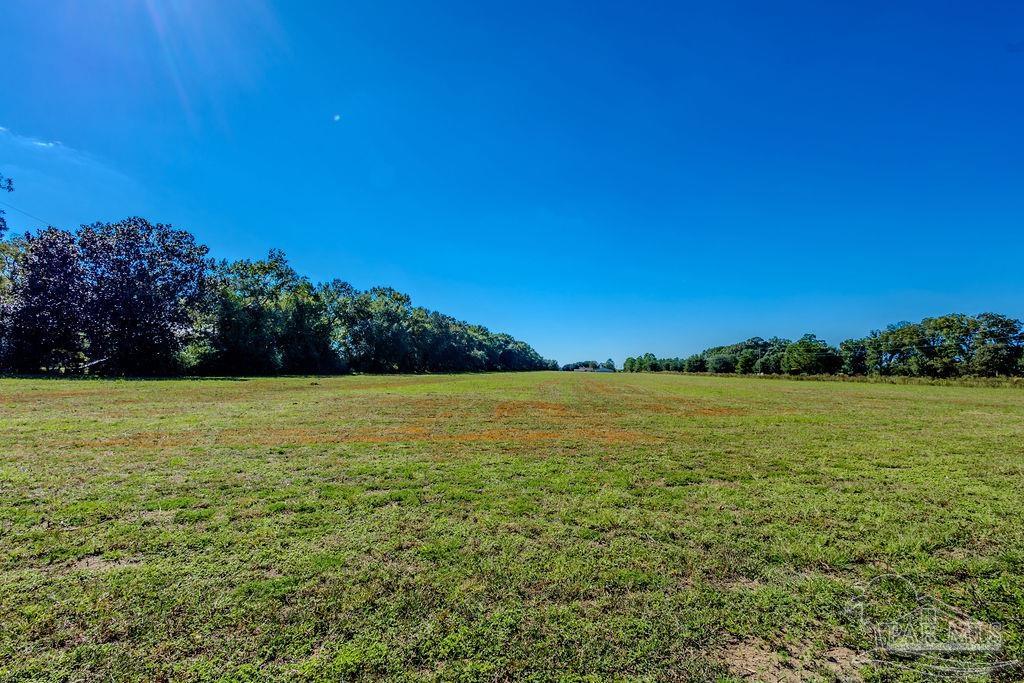 4 A Tidwell Road Pace, FL 32571 - Photo 11 of 13 a view of an ocean and beach