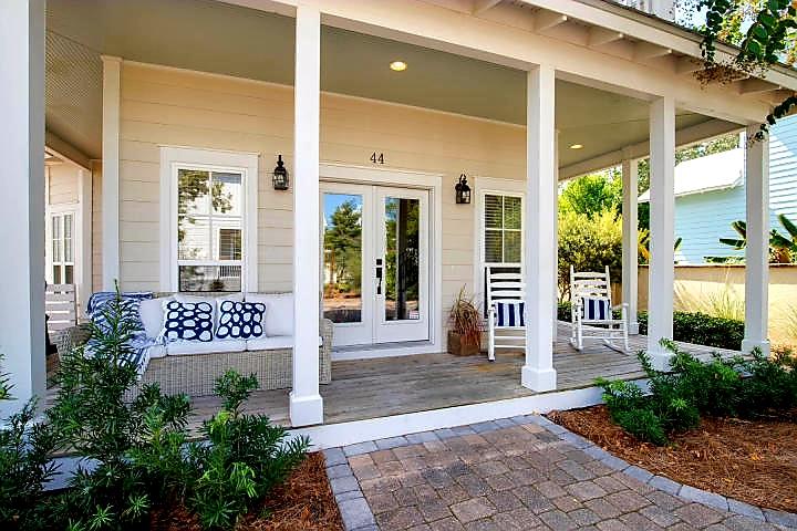 44 Grande Pointe Drive Inlet Beach, FL 32461 - Photo 2 of 32 a front view of a building with a garden