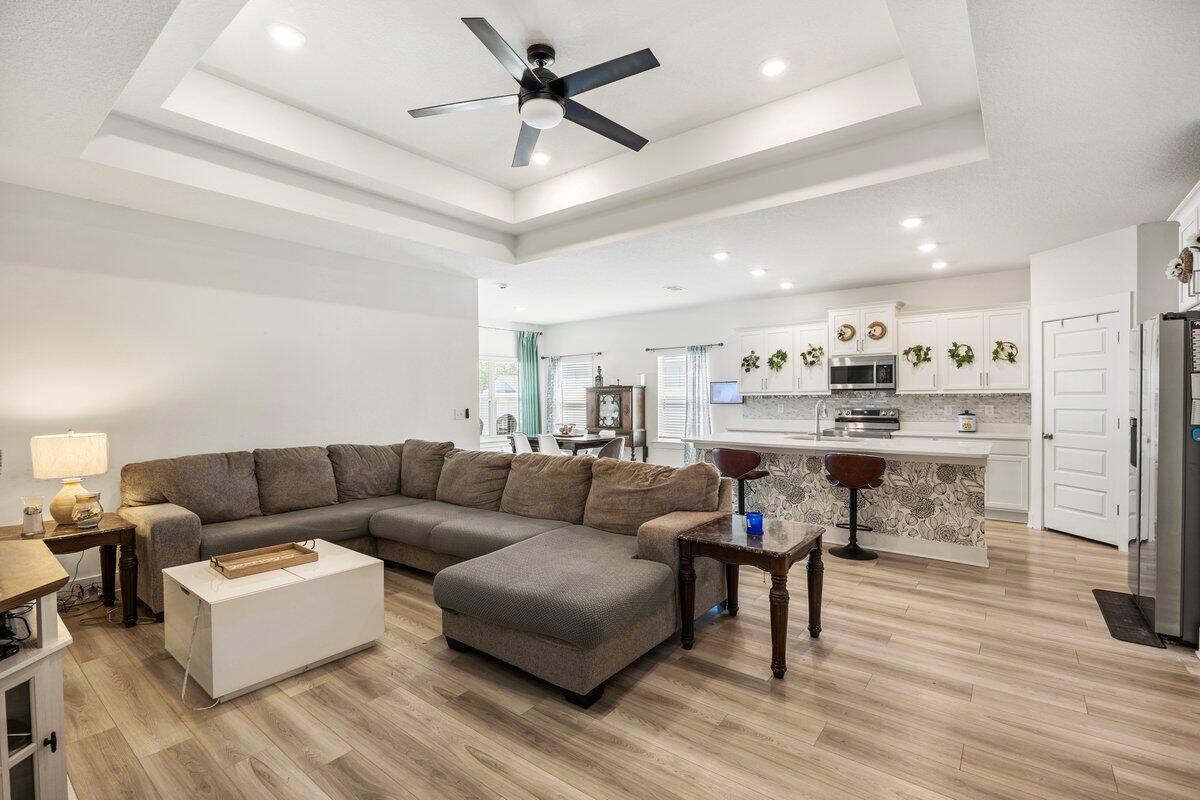 211 Lyla Lane Crestview, FL 32539 - Photo 12 of 38 a living room with furniture and kitchen view