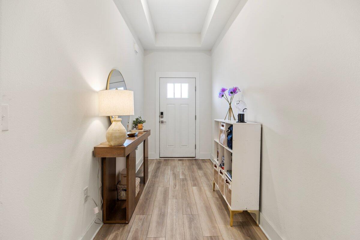 211 Lyla Lane Crestview, FL 32539 - Photo 2 of 38 a view of hallway with wooden floor