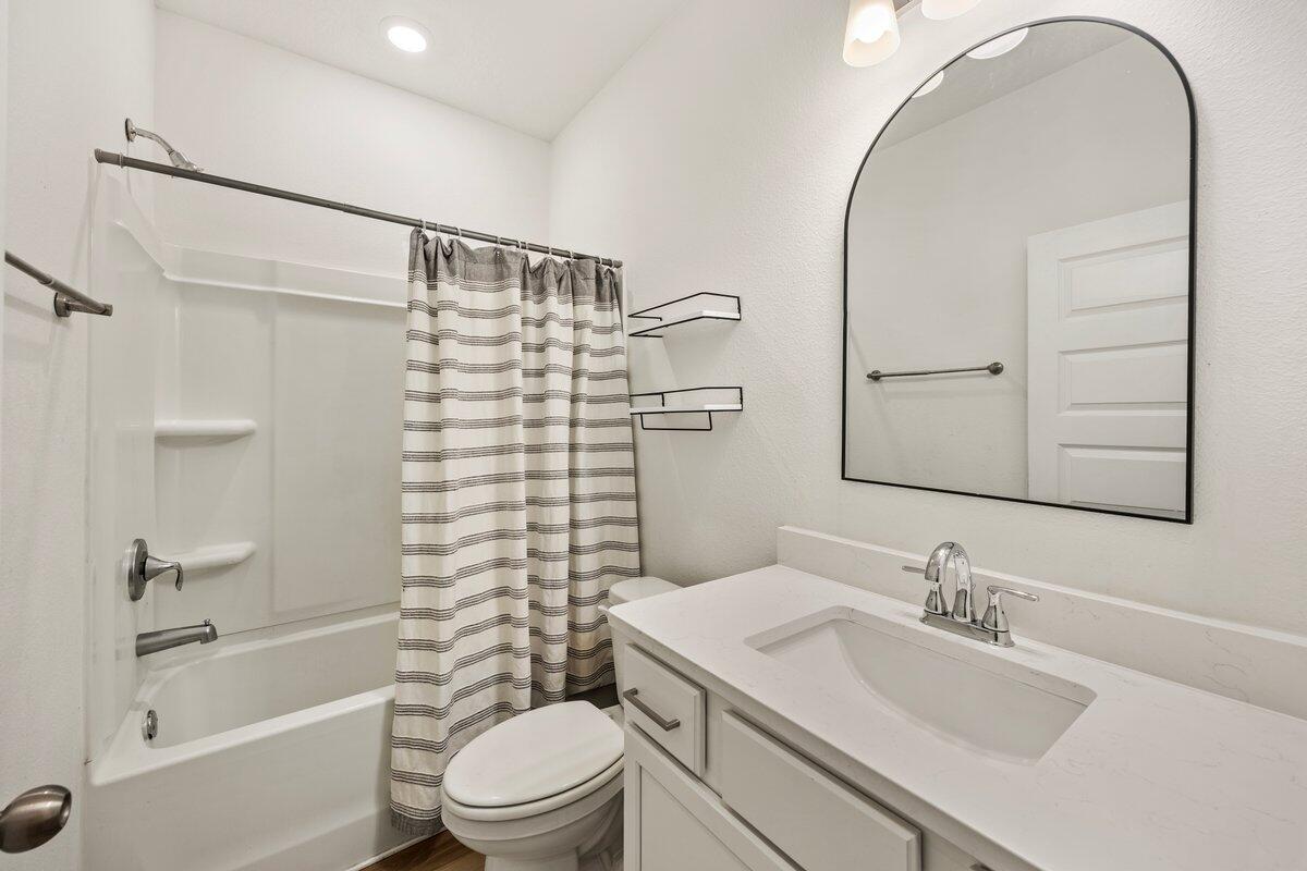 211 Lyla Lane Crestview, FL 32539 - Photo 29 of 38 a bathroom with a sink a toilet and shower