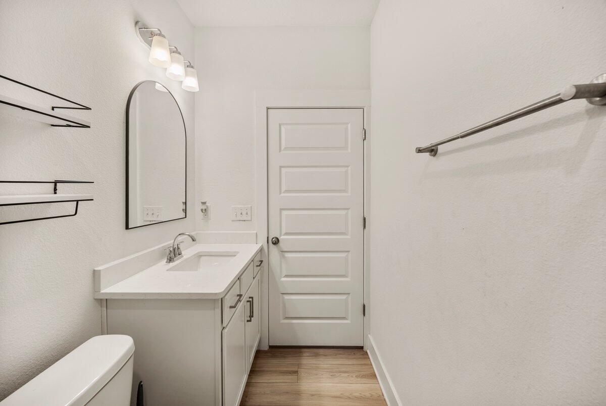 211 Lyla Lane Crestview, FL 32539 - Photo 30 of 38 a bathroom with a sink and a mirror