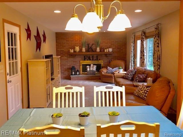 11249 Buno Road Brighton, MI 48114 - Photo 2 of 56 Cozy Family Room