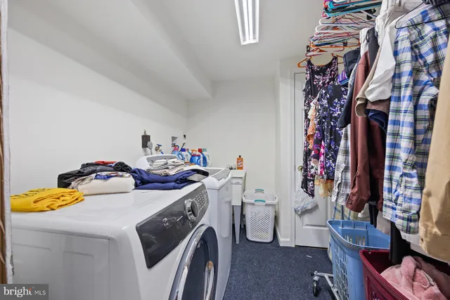 a bedroom with a bed and a storage