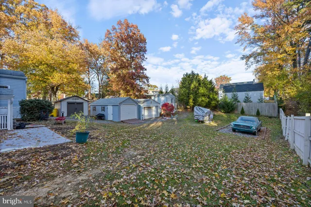 a view of a chairs in a backyard