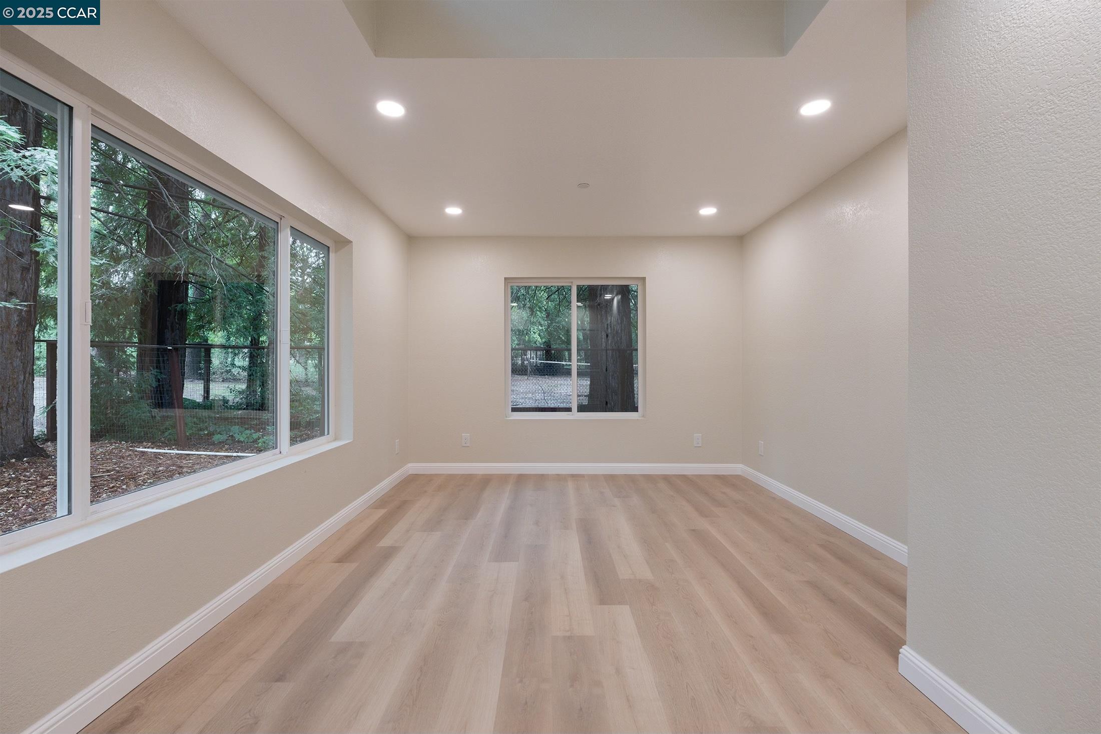 1244 A Stone Valley Road Alamo, CA 94507 - Photo 17 of 20 a view of an empty room with wooden floor and a window
