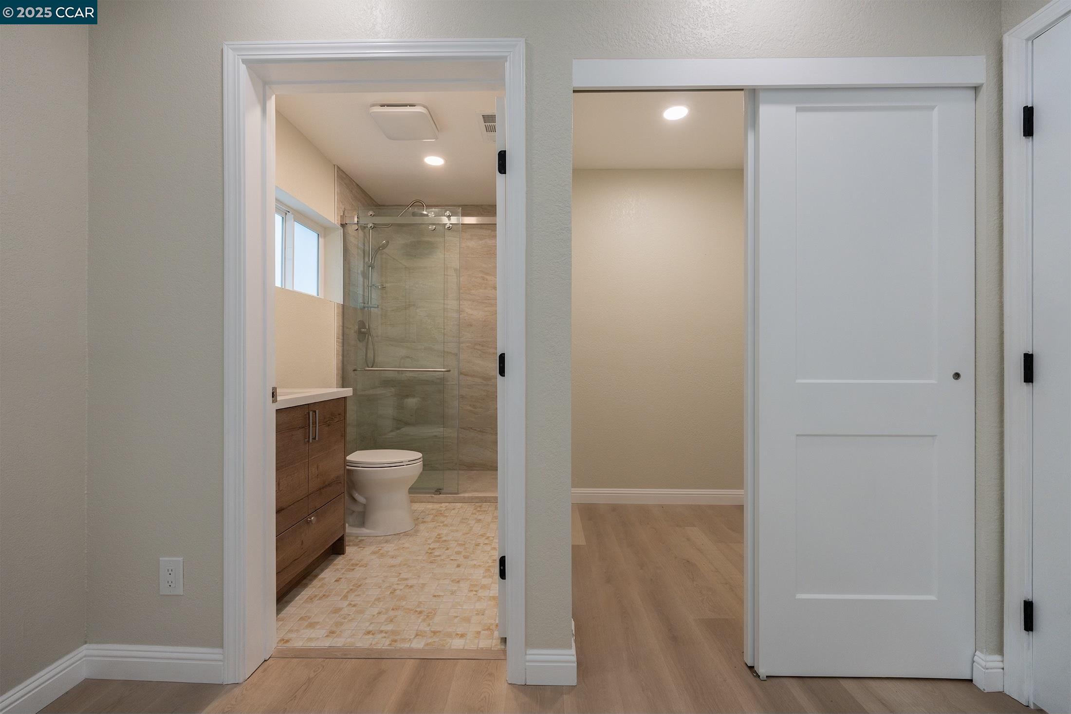 1244 A Stone Valley Road Alamo, CA 94507 - Photo 18 of 20 a bathroom with a glass shower door