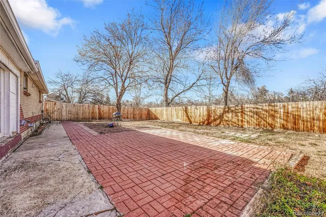 a view of a yard with an trees