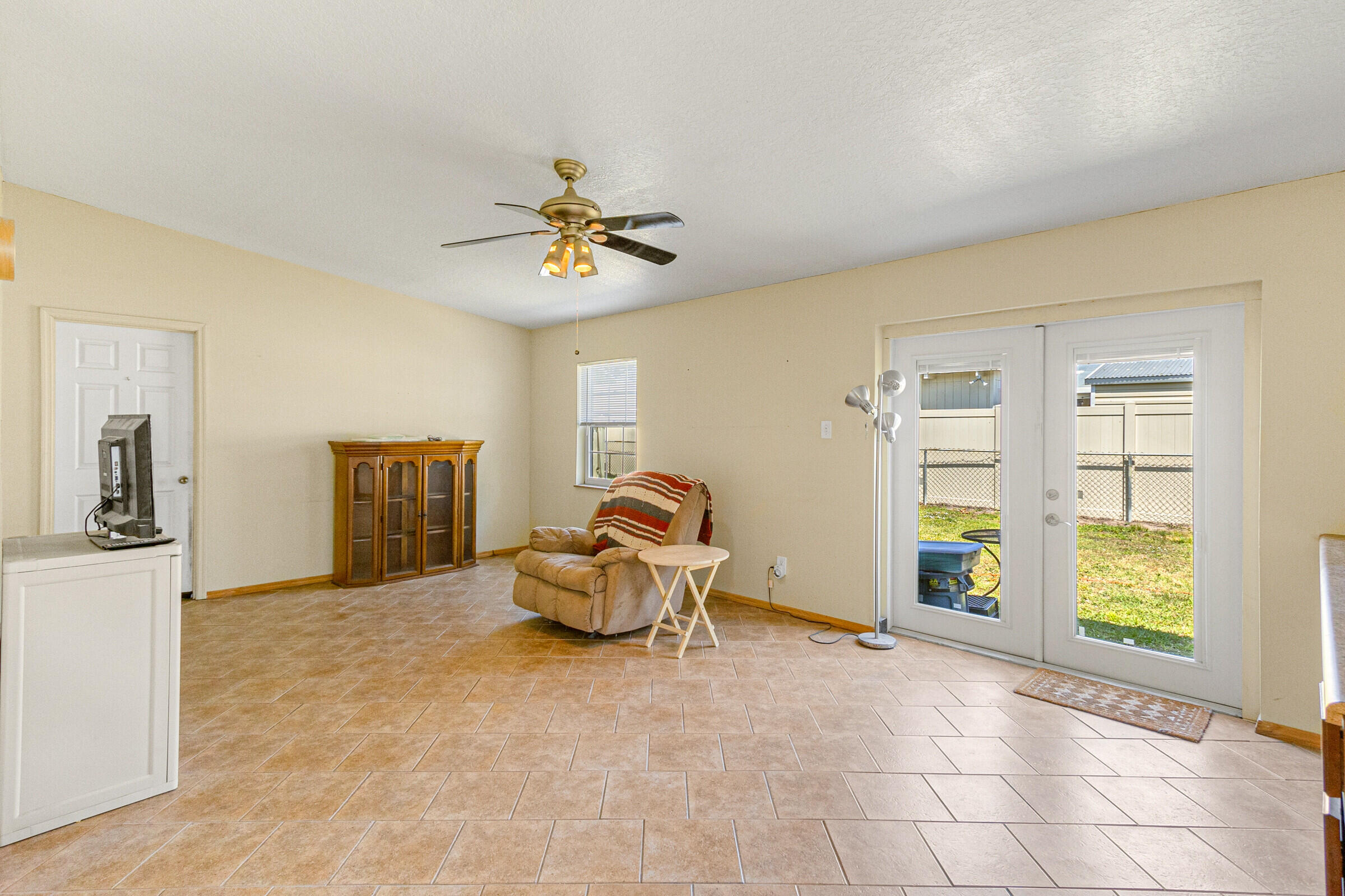 542 Sylvia Road Melbourne, FL 32904 - Photo 29 of 37 a living room with furniture and a window