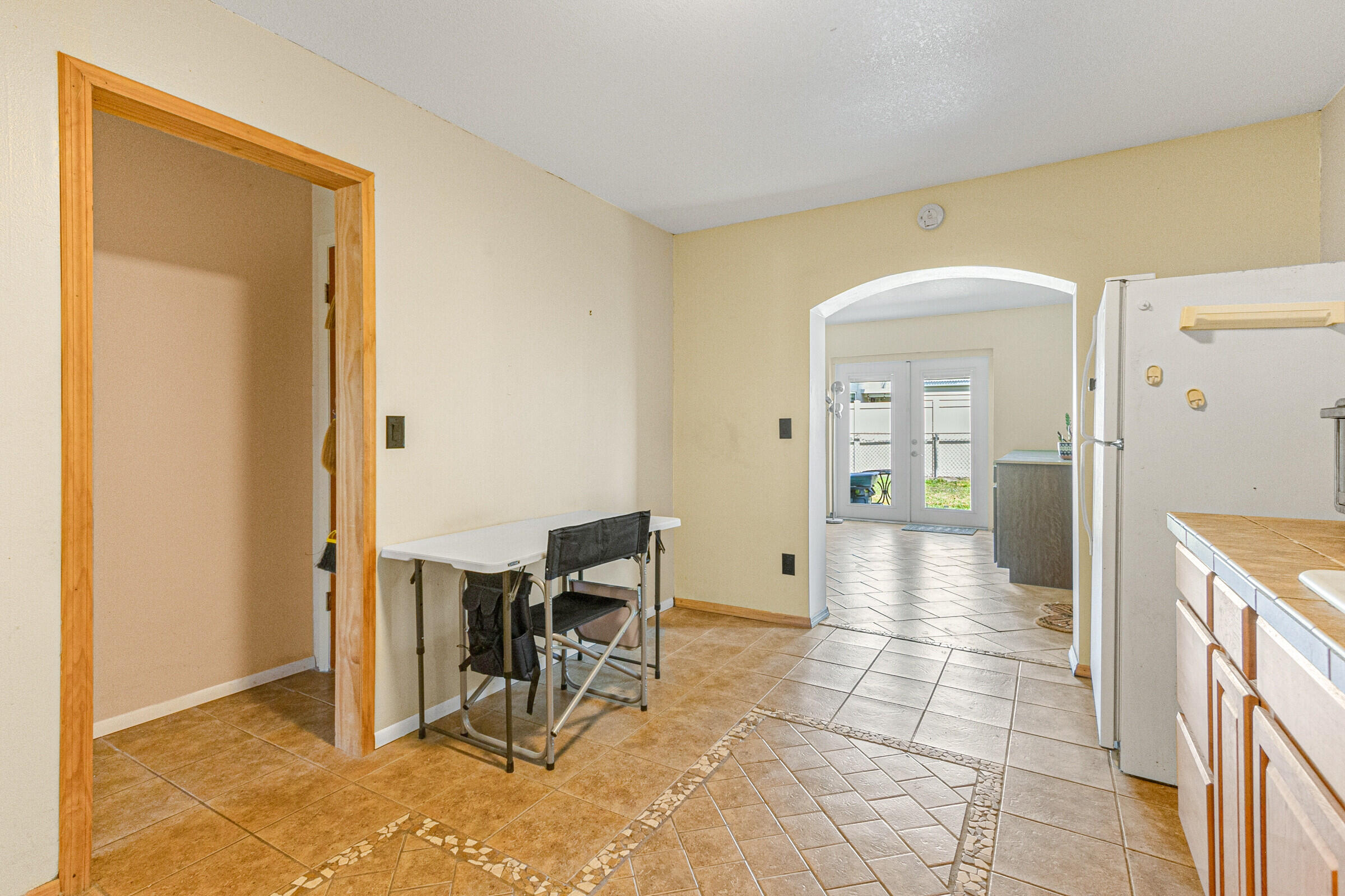 542 Sylvia Road Melbourne, FL 32904 - Photo 33 of 37 a view of a hallway with dining area