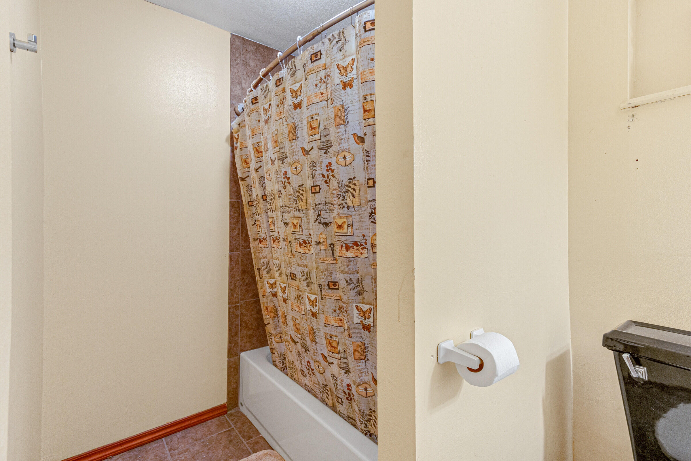 542 Sylvia Road Melbourne, FL 32904 - Photo 34 of 37 a bathroom with a shower curtain