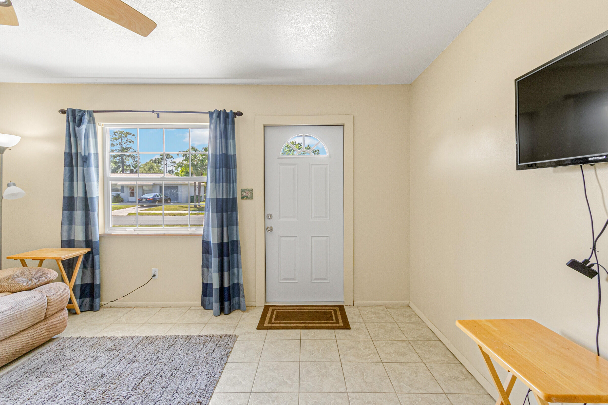 542 Sylvia Road Melbourne, FL 32904 - Photo 6 of 37 a view of an entryway with a couch