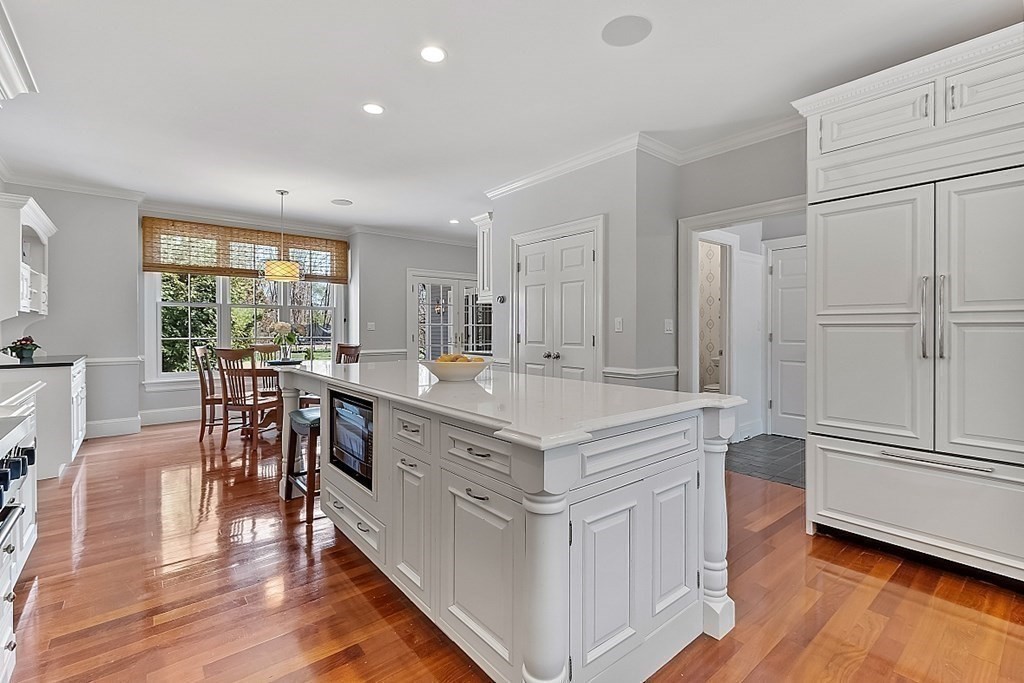 490 Lexington Road Concord, MA 01742 - Photo 11 of 40 a kitchen with stainless steel appliances granite countertop a stove and a refrigerator