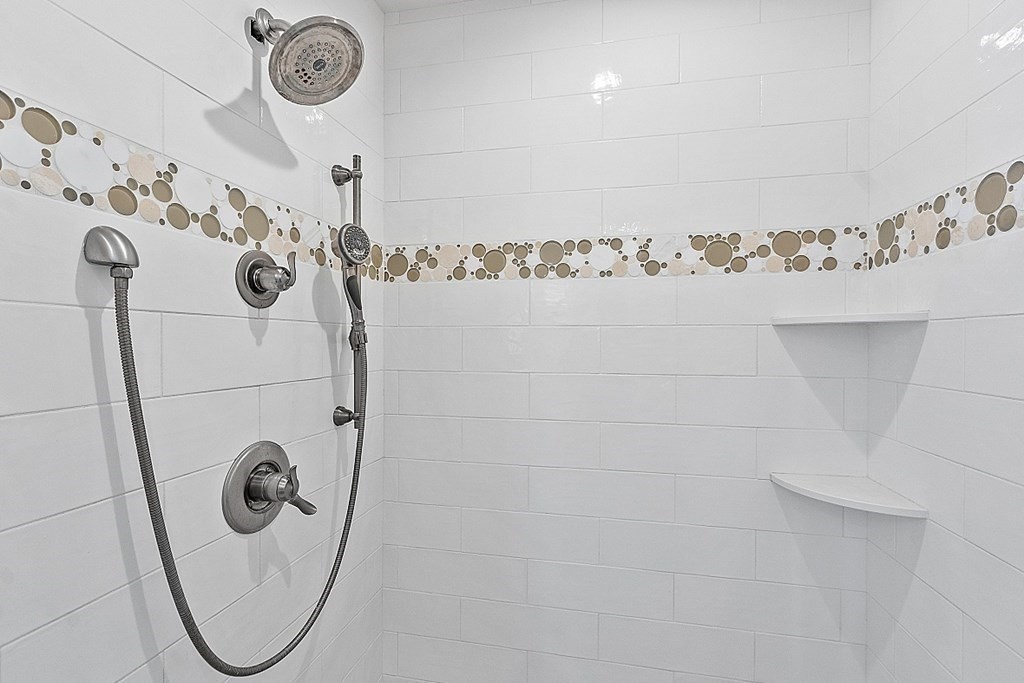 490 Lexington Road Concord, MA 01742 - Photo 23 of 40 a bathroom with a bathtub