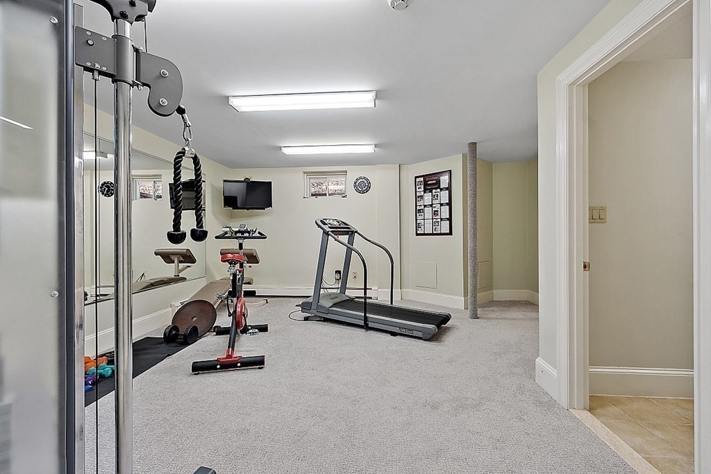 490 Lexington Road Concord, MA 01742 - Photo 33 of 40 a view of a room with gym equipment