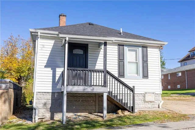 a front view of a house with garage