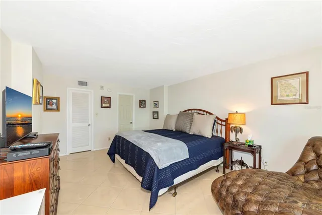a view of storage and utility room with washer and dryer