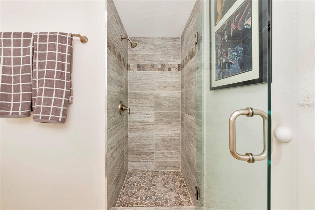 101 South Gulfstream Avenue, Unit 16C Sarasota, FL 34236 - Photo 34 of 86 a bathroom with a shower