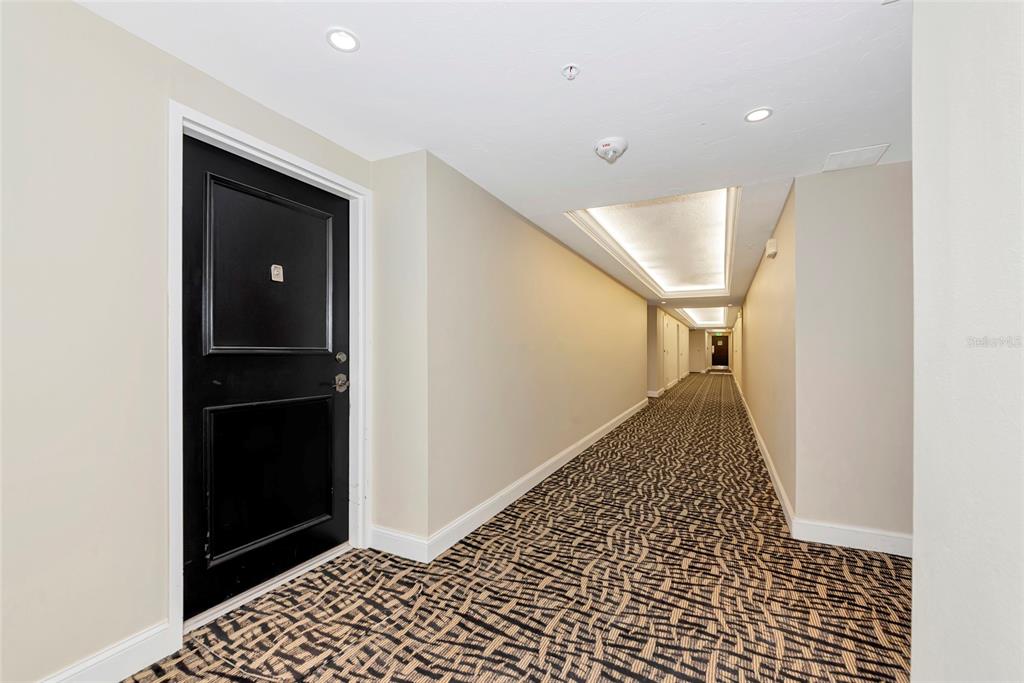 101 South Gulfstream Avenue, Unit 16C Sarasota, FL 34236 - Photo 44 of 86 a view of a hallway