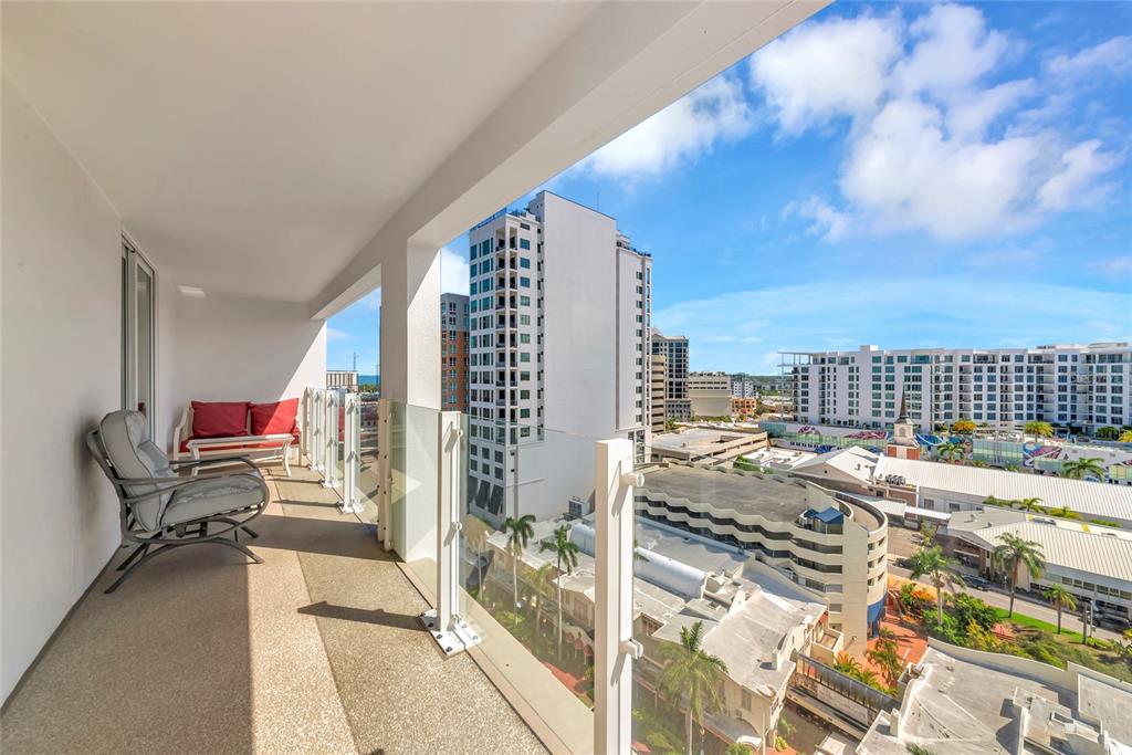 101 South Gulfstream Avenue, Unit 16C Sarasota, FL 34236 - Photo 5 of 86 a view of a city from a lounge chairs