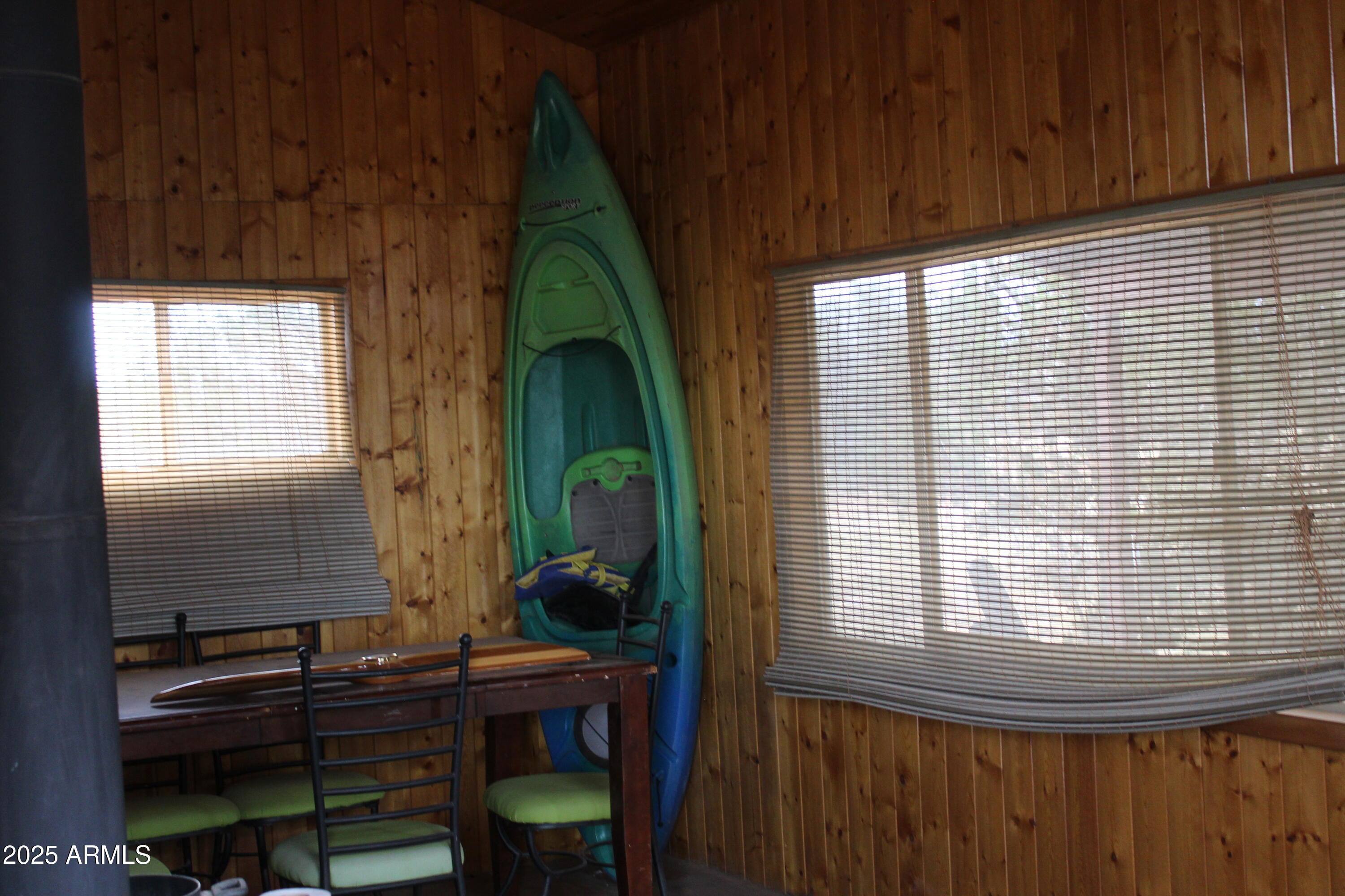 979 Elk Run Heber, AZ 85928 - Photo 10 of 12 a bathroom with a sink a mirror and next to a window