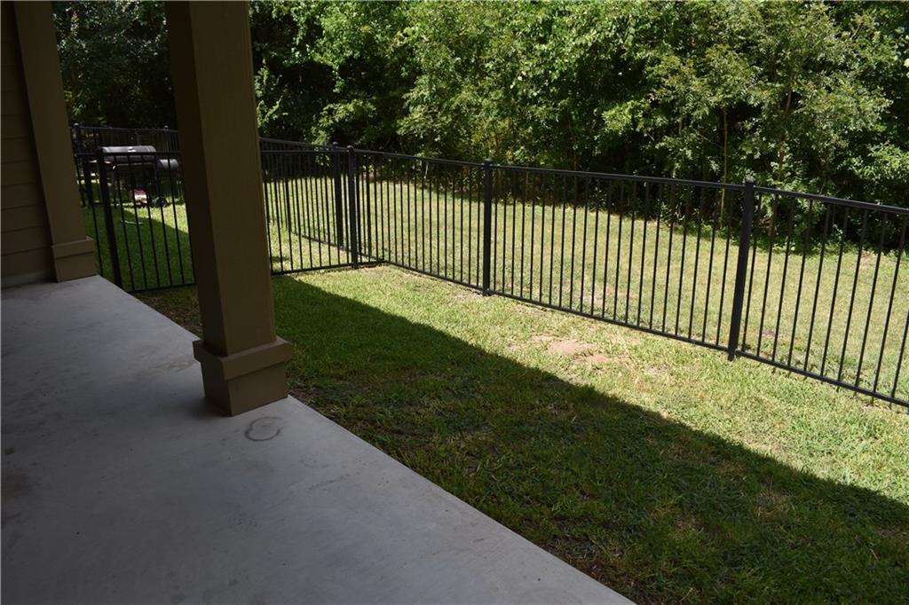 1310 West Parmer Lane, Unit 1503 Austin, TX 78727 - Photo 21 of 26 View of fenced backyard