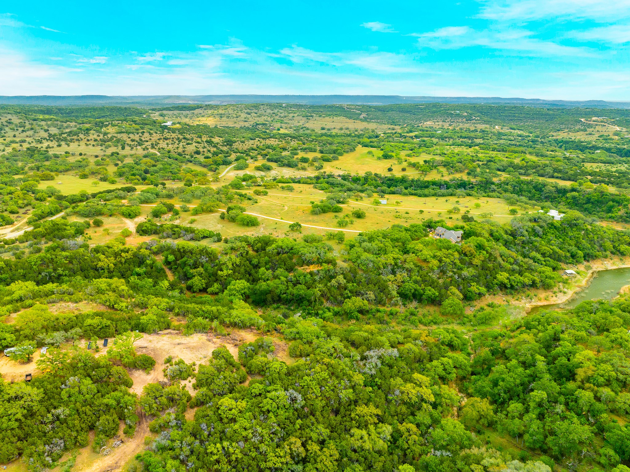 28205 Turner Ranch Road Marble Falls, TX 78654 - Photo 6 of 39 Drone / aerial view of a heavily wooded area