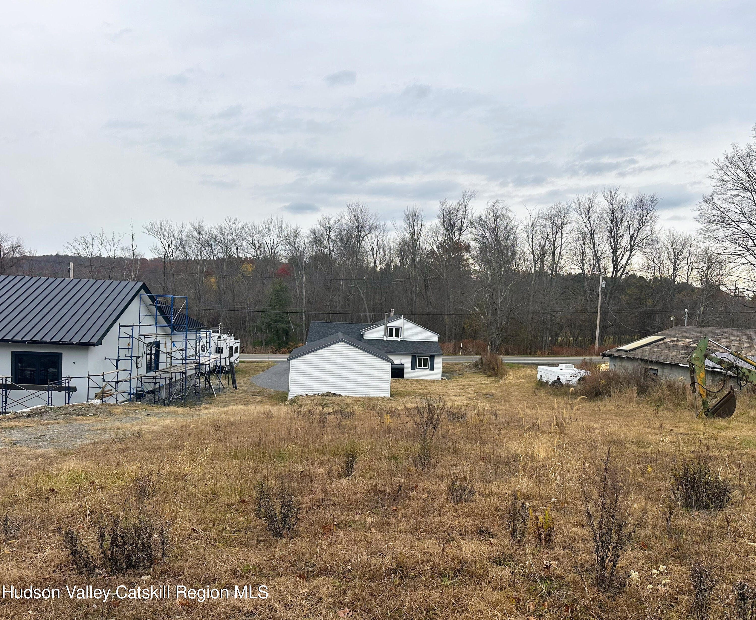 3264 County Route 7 Ancram, NY 12502 - Photo 17 of 19 a view of a house with backyard and sitting area