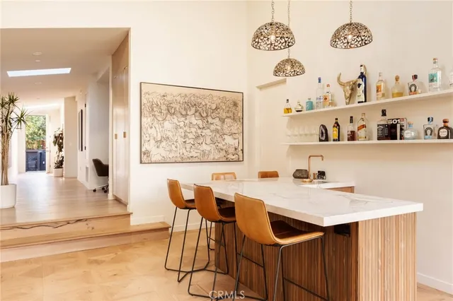 a living room with furniture and flat screen tv