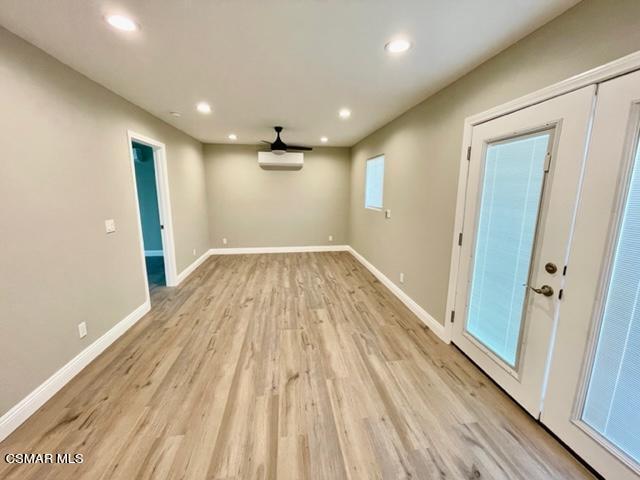 1243 Able Circle Simi Valley, CA 93065 - Photo 4 of 10 a view of empty room with wooden floor