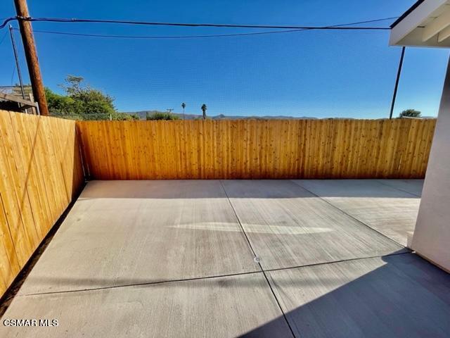 1243 Able Circle Simi Valley, CA 93065 - Photo 9 of 10 a view of a backyard with wooden fence