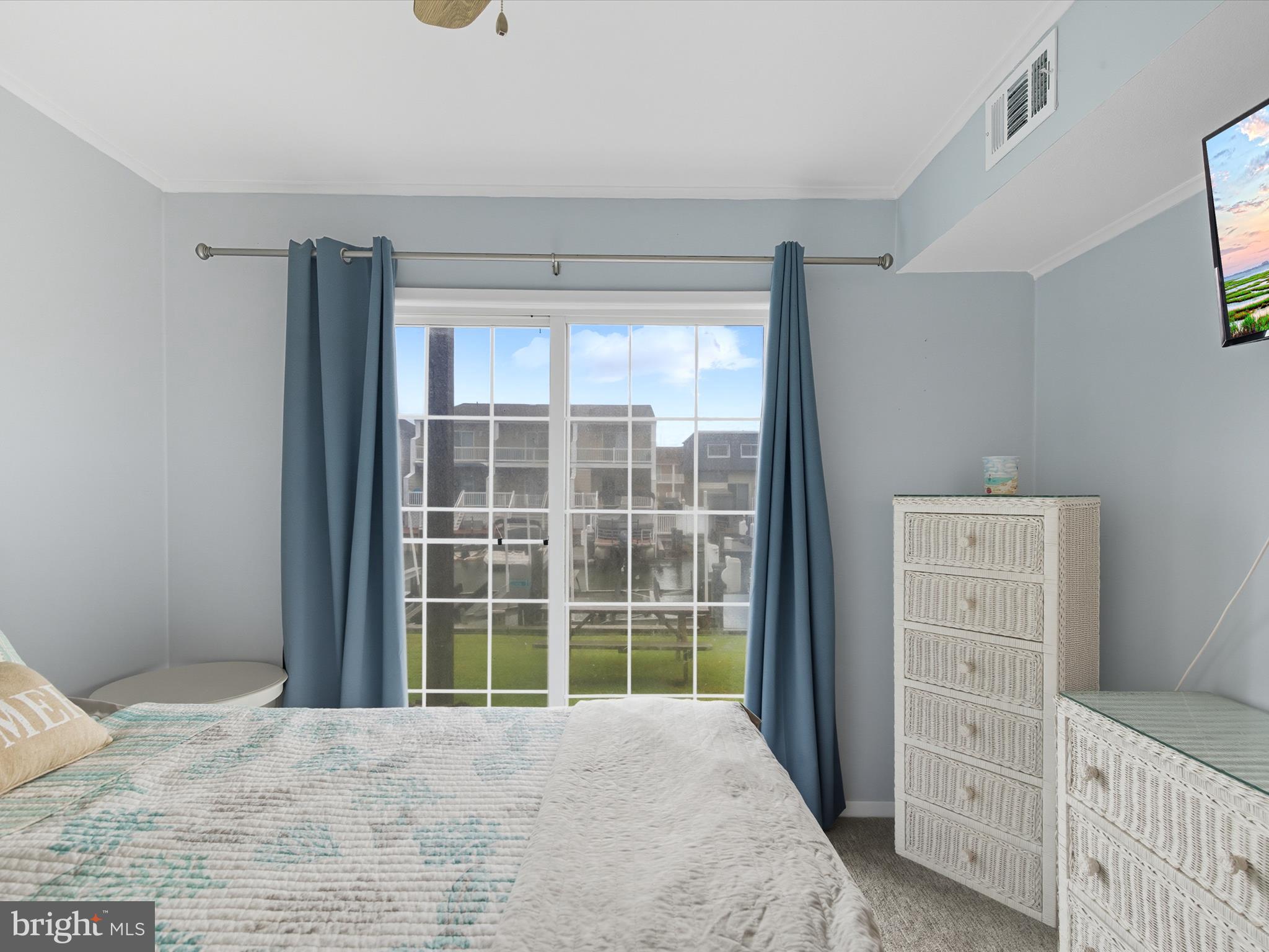 710 Bradley Road, Unit A2 Ocean City, MD 21842 - Photo 16 of 40 a view of an empty room with a window