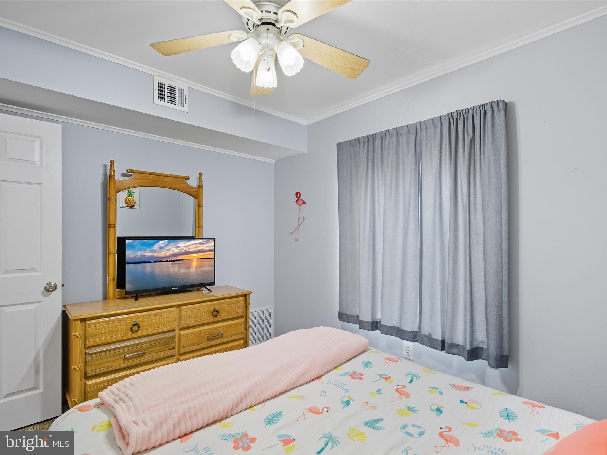 710 Bradley Road, Unit A2 Ocean City, MD 21842 - Photo 21 of 40 a bedroom with a bed and furniture