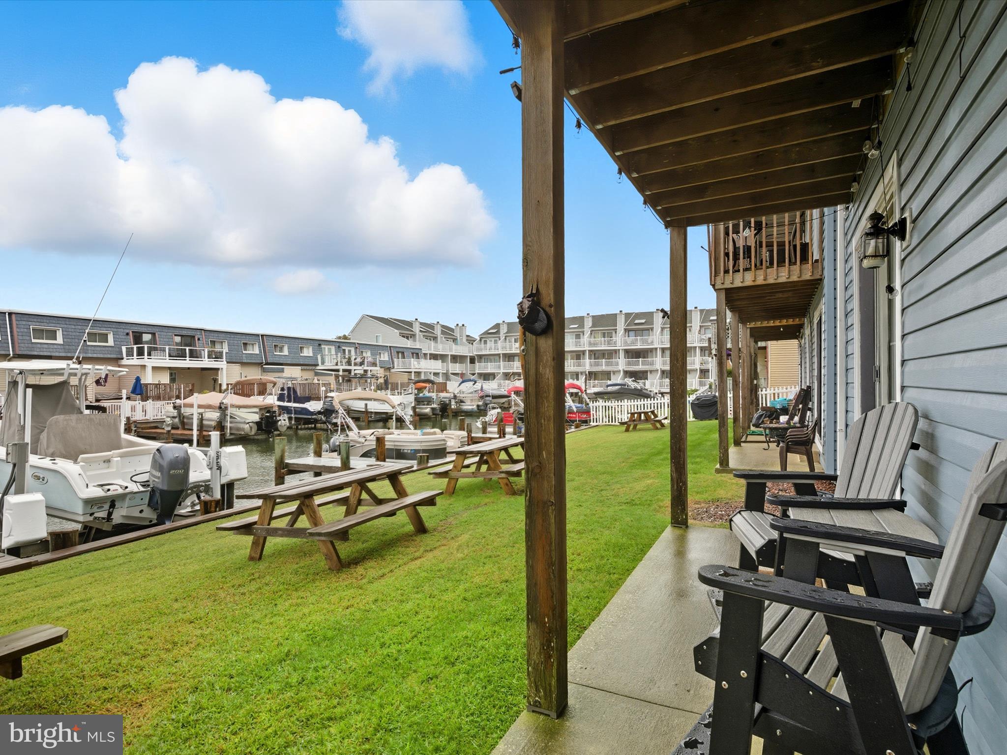 710 Bradley Road, Unit A2 Ocean City, MD 21842 - Photo 29 of 40 a view of a garden with lawn chairs