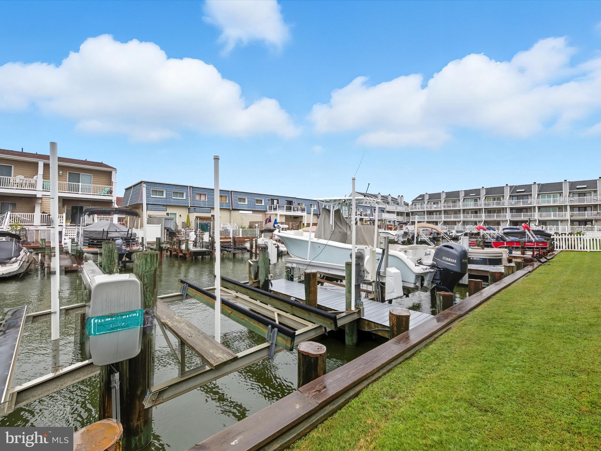710 Bradley Road, Unit A2 Ocean City, MD 21842 - Photo 34 of 40 a view of a chairs and table in the terrace