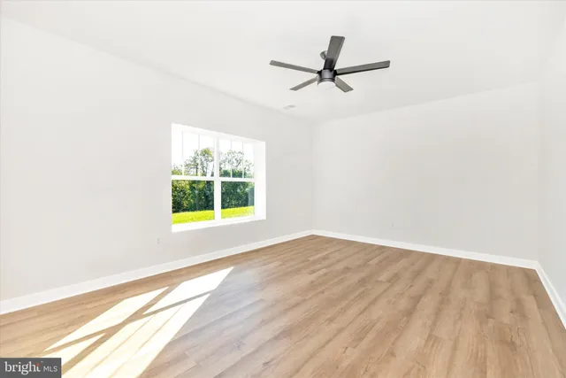 a view of a window in an empty room