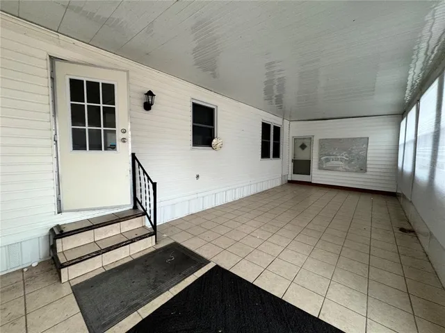 a view of front of house with a yard