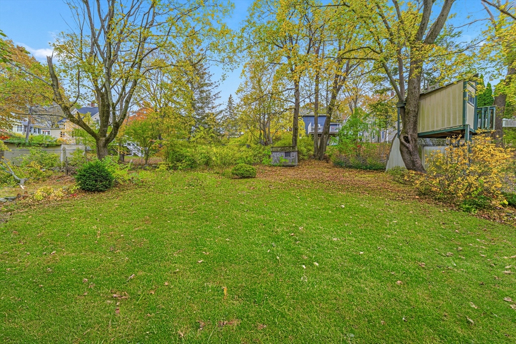 5 Springdale Avenue Saugus, MA 01906 - Photo 7 of 25 a backyard of a house with lots of green space