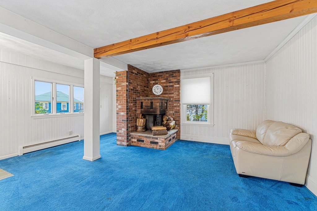 5 Springdale Avenue Saugus, MA 01906 - Photo 9 of 25 a living room with furniture and a wooden floor