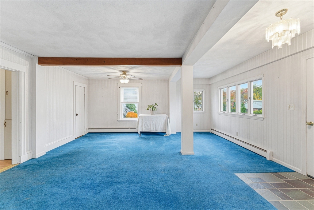 5 Springdale Avenue Saugus, MA 01906 - Photo 10 of 25 a view of an empty room with window and wooden floor