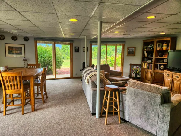 a view of a dining room with furniture